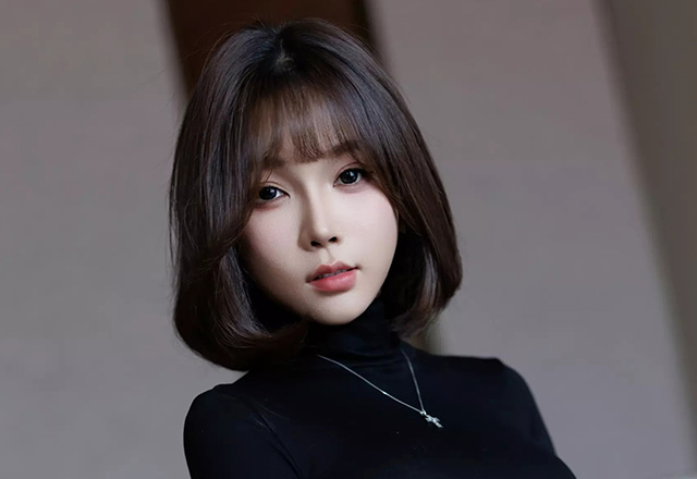 美腿女神徐莉芝蓝色格子短裙写真图